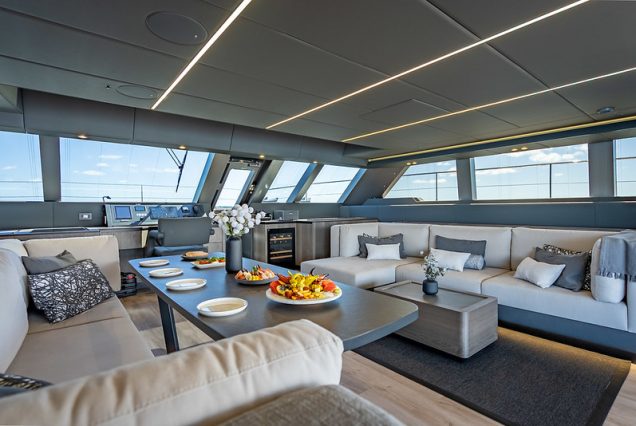 Sunreef 70ft ARCHIPIELAGO Miami luxury lounge with table for refined social gatherings