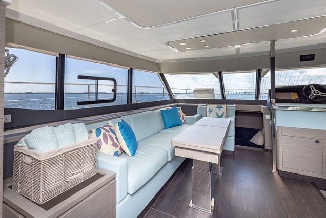 50ft Fountaine Happy Place Miami contemporary lounge with table for entertainment