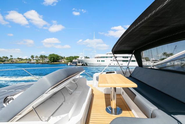 70ft SunSeeker Done Deal Miami front deck with comfortable modern seating area