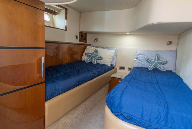 52ft Sea Ray Bridge Miami guest cabin with elegant interiors and comfortable sleeping space