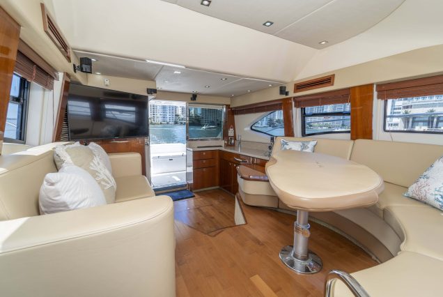52ft Sea Ray Bridge Miami sophisticated indoor salon with plush seating and elegant décor