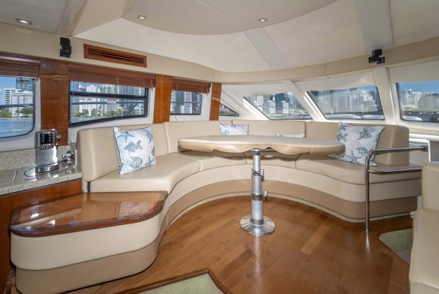 52ft Sea Ray Bridge Miami stylish lounge with table for entertainment and social moments