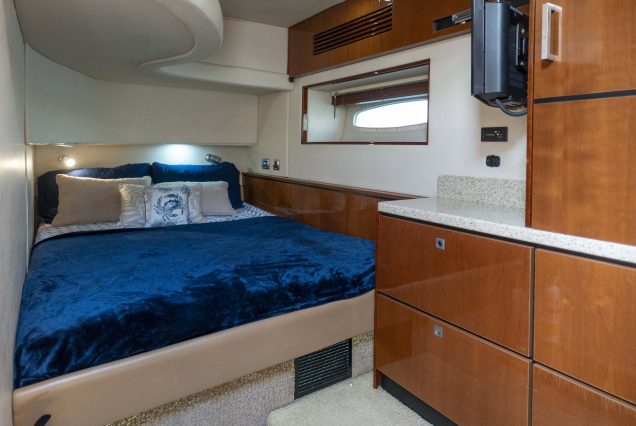 52ft Sea Ray Bridge Miami guest cabin with elegant interiors and comfortable sleeping space