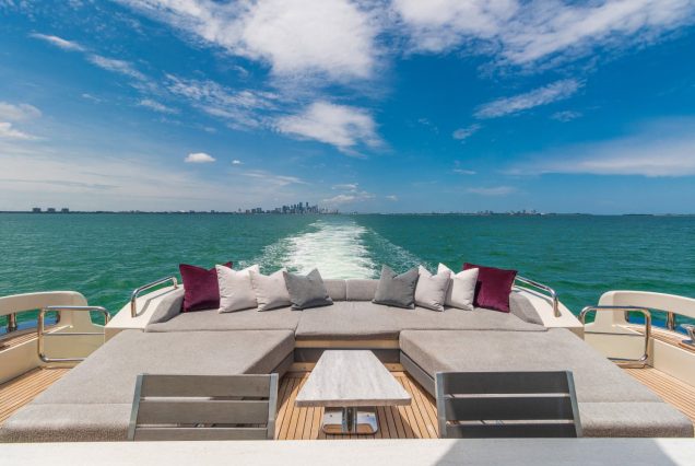 Scarlet 103ft Azimut Flybridge Miami bow lounge area with stunning waterfront and skyline views