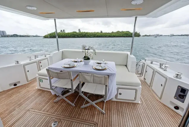 70ft Azimut Le Grand Bleu Miami smooth boarding access to all entertainment areas with comfortable seating and table
