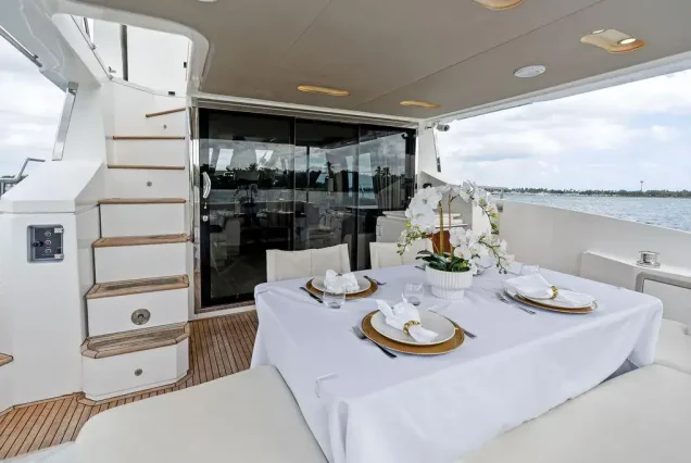 70ft Azimut Le Grand Bleu Miami smooth boarding access to all entertainment areas with comfortable seating and table