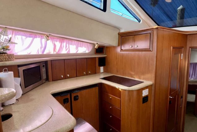 ESCAPE PINK 47ft Silverton Miami fully equipped galley with modern layout