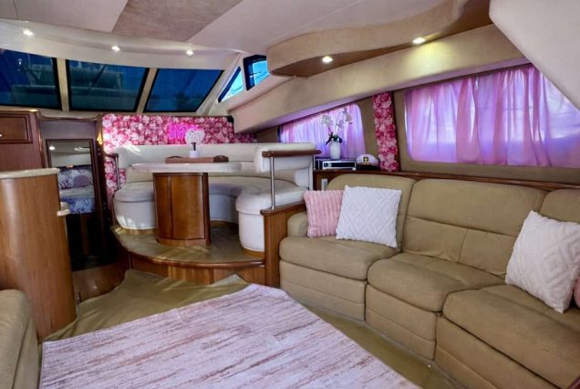 ESCAPE PINK 47ft Silverton Miami stylish indoor salon with comfortable seating