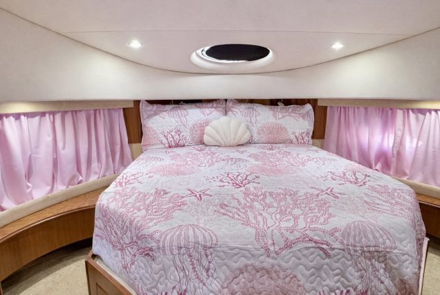 ESCAPE PINK 47ft Silverton Miami guest cabin with cozy design and comfortable sleeping space