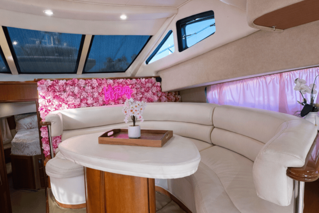 ESCAPE PINK 47ft Silverton Miami stylish indoor salon with comfortable seating