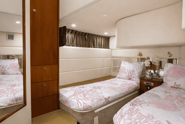 ESCAPE PINK 47ft Silverton Miami spacious master bedroom designed for a relaxing onboard stay