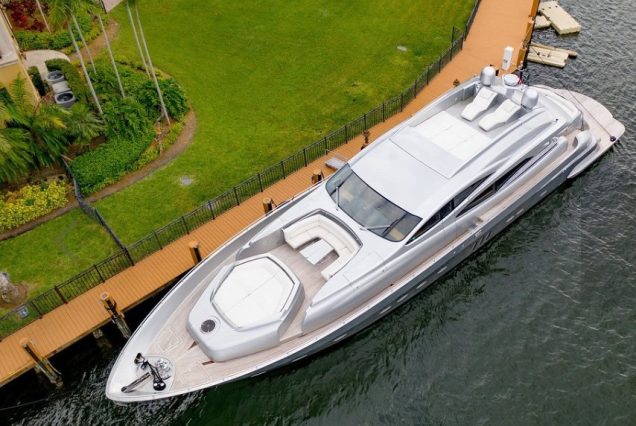 Shadow 94ft Pershing Miami bow lounge area with stunning waterfront and skyline views