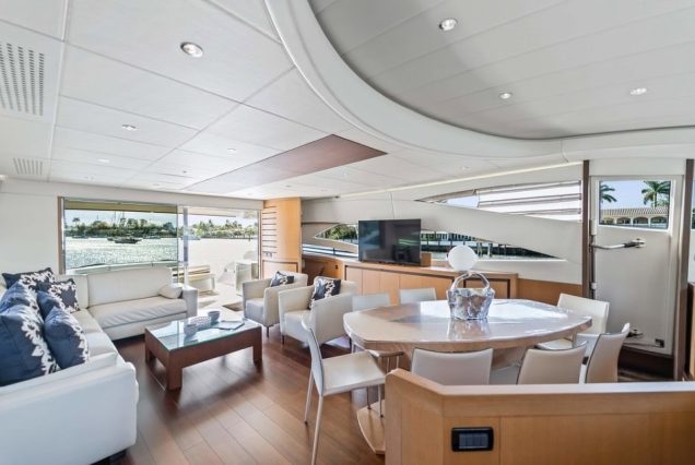 Shadow 94ft Pershing Miami stylish lounge with table for entertainment and gatherings