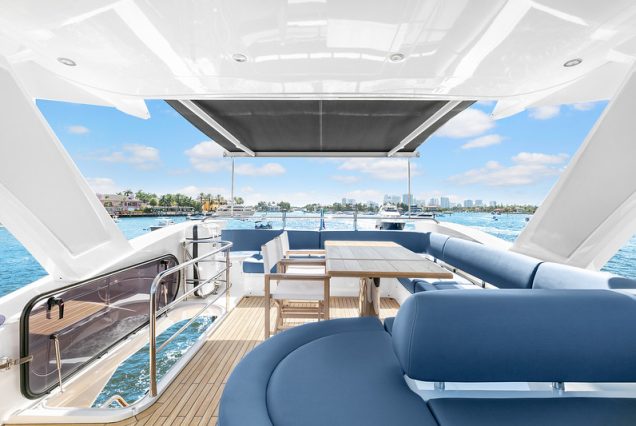 70ft SunSeeker Done Deal Miami upper deck seating with table for cocktails and dining