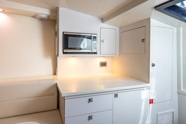 Luxury 40ft Van Dutch Miami compact galley with high-end finishes