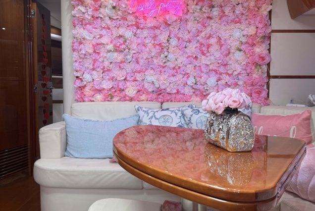 Velocity 50ft Pershing Miami sophisticated indoor salon with modern seating and elegant décor