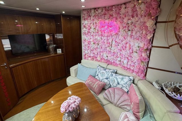Velocity 50ft Pershing Miami sophisticated indoor salon with modern seating and elegant décor