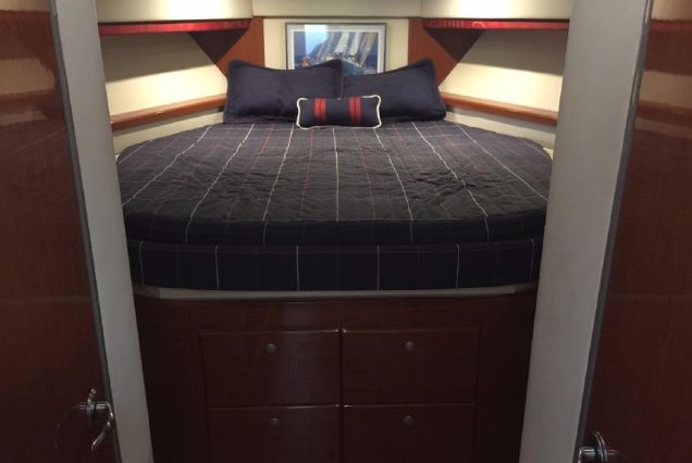 48ft Formula Blessed Yacht Miami guest cabin with elegant interiors and comfortable sleeping space