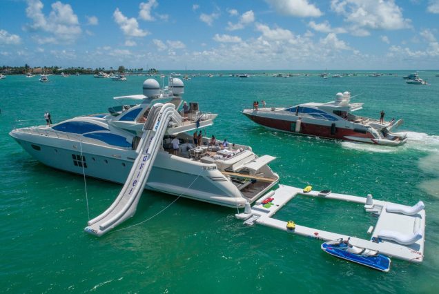 Scarlet 103ft Azimut Flybridge Miami superyacht available for luxury charter experiences with premium add-ons