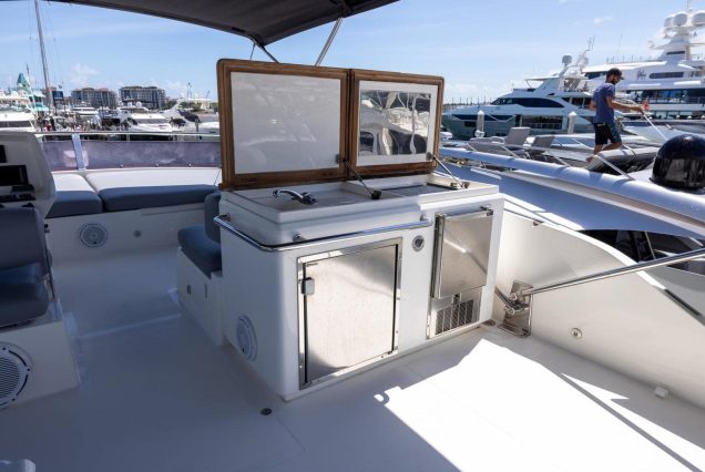 Modern 65ft Numarine Sebastian Miami flybridge setup with bbq onboard