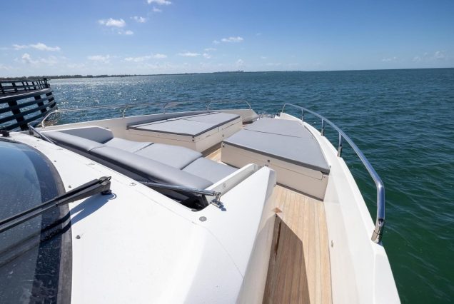 Modern 65ft Numarine Sebastian Miami bow lounge area with scenic waterfront views