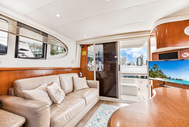 41ft Silverton Miami stylish lounge with table for entertainment and relaxation