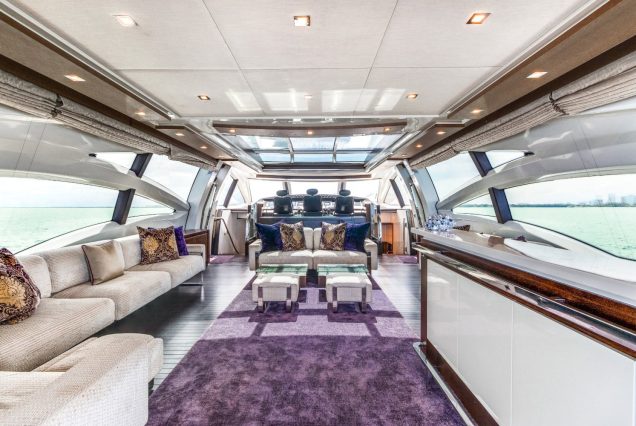 Scarlet 103ft Azimut Flybridge Miami sophisticated indoor salon with plush seating and elegant décor