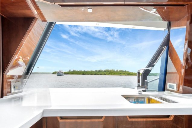 Modern 53FT Galeon Miami fully equipped galley with premium appliances and sleek finishes