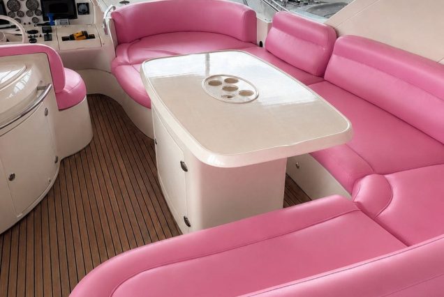AZIMUT Victoria 70ft Pink Miami flybridge social area with cooler space and premium seating
