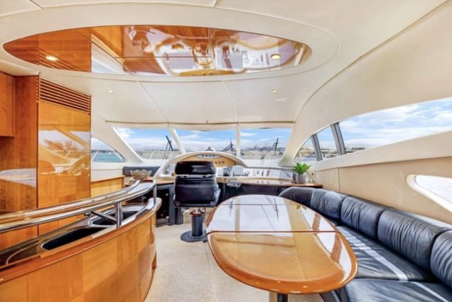 AZIMUT Victoria 70ft Pink Miami stylish lounge with table for entertainment and social gatherings