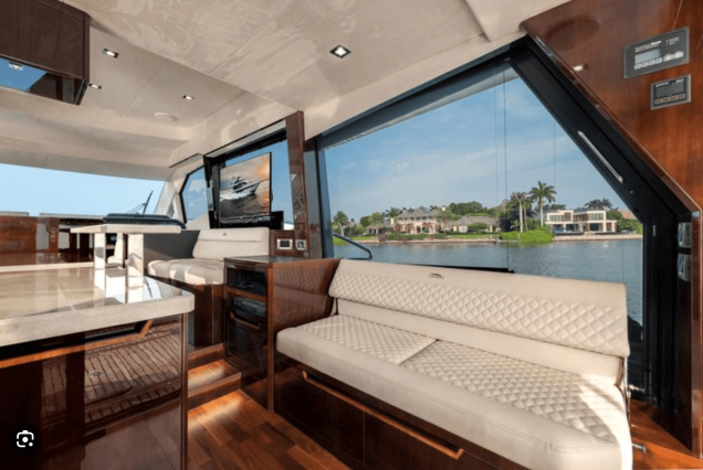 Modern 53FT Galeon Miami contemporary lounge with table for entertainment and social gatherings