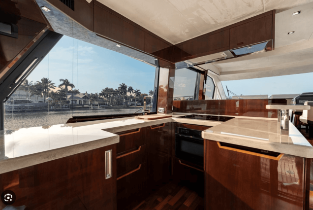 Modern 53FT Galeon Miami fully equipped galley with premium appliances and sleek finishes