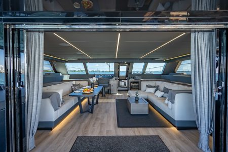 Sunreef 70ft ARCHIPIELAGO Miami luxury lounge with table for refined social gatherings
