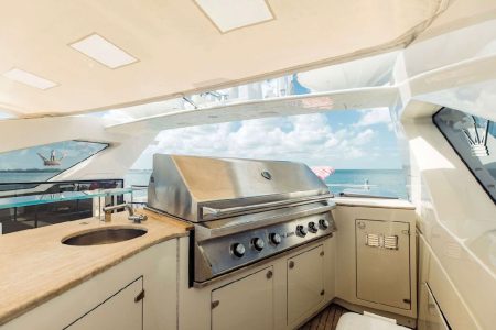 Luxury 110ft Dominator Senay Miami superyacht with jacuzzi available for charter with bbq grill.