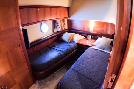 Azimut 57ft Modern Yacht guest cabin with comfortable sleeping space for charter stays